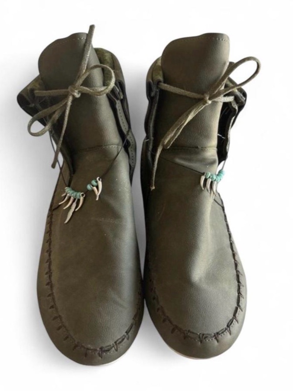Green leather moccasin boots